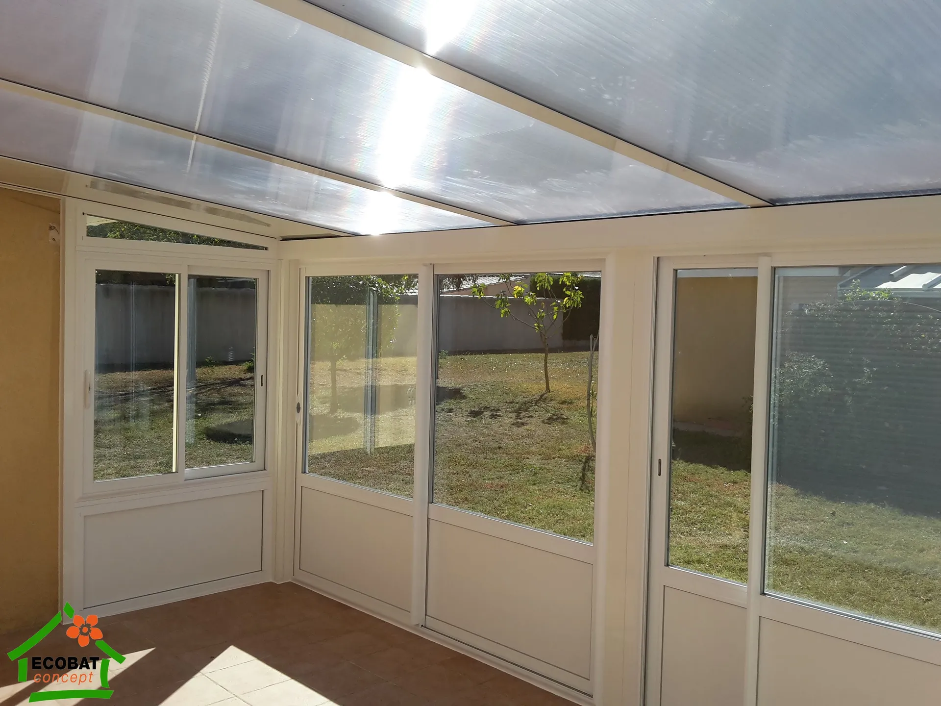 Réalisation d'une véranda aluminium avec toiture transparente à La Calmette - Photo 3