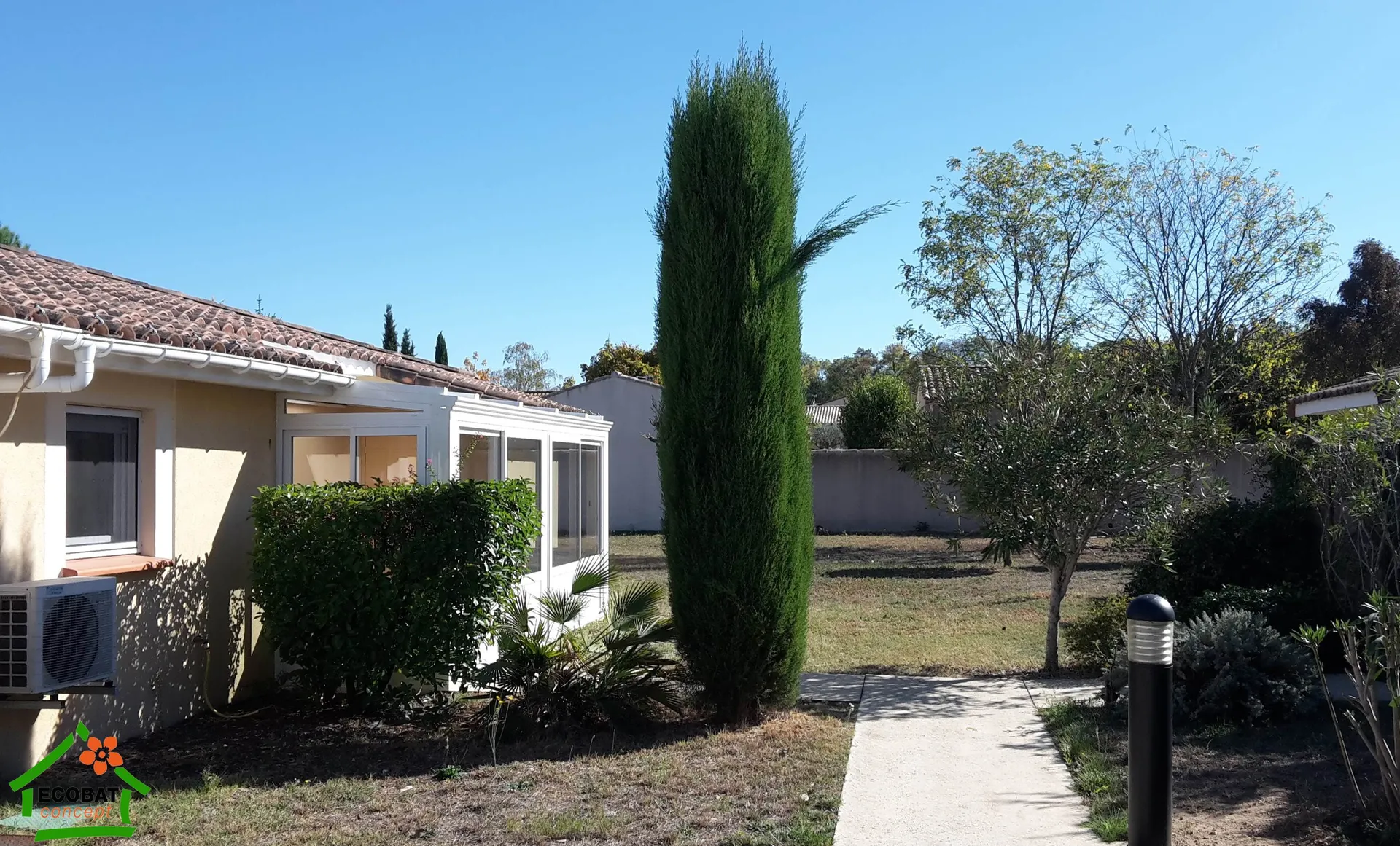 Réalisation d'une véranda aluminium avec toiture transparente à La Calmette - Photo 2