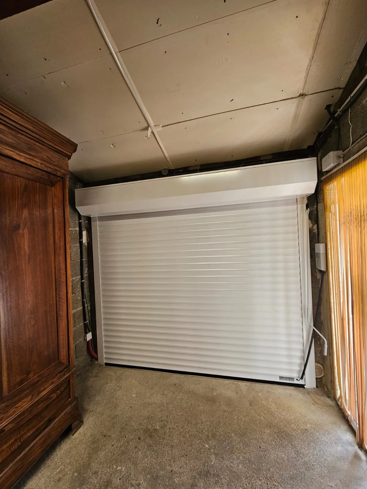 Porte de garage enroulable à La Calmette - Photo 1